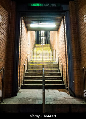 Stairway to a car park in Leeds City Centre on a lovely winter's evening. Lots of bright lights and plenty of people having fun Stock Photo