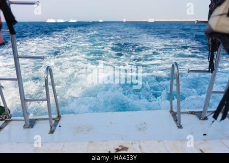 View of a ship's wave wake in a turquoise sea Stock Photo