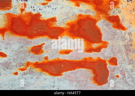 orange rust on metal surface, texture of weathered board Stock Photo