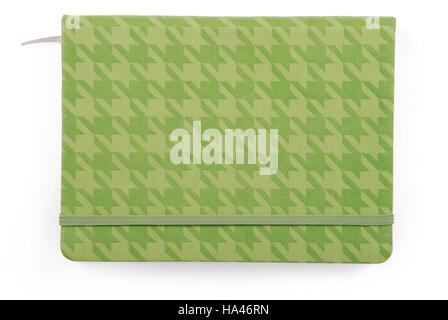 Green closed notepad isolated on white background with soft shadow (Clipping path) Stock Photo