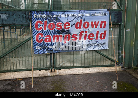 Kidlington, UK. 26th Nov, 2016. A banner brought by campaigners against immigration detention protesting outside Campsfield House Immigration Removal Centre on the 23rd anniversary of its opening to call for its closure. Credit:  Mark Kerrison/Alamy Live News Stock Photo
