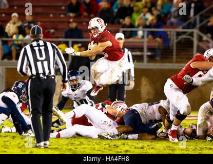 Palo Alto, California, USA. 26th Nov, 2016. Stanford Running Back Christian McCaffrey (5) leaps over the Rice defense in NCAA football action at Stanford University, featuring the Rice Owls visiting the Stanford Cardinal. Stanford won the game 41-17. © Seth Riskin/ZUMA Wire/Alamy Live News Stock Photo