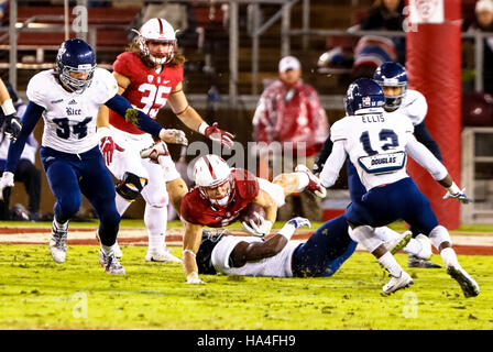 Palo Alto, California, USA. 26th Nov, 2016. Stanford Running Back Christian McCaffrey (5) goes airborne in NCAA football action at Stanford University, featuring the Rice Owls visiting the Stanford Cardinal. Stanford won the game 41-17. © Seth Riskin/ZUMA Wire/Alamy Live News Stock Photo