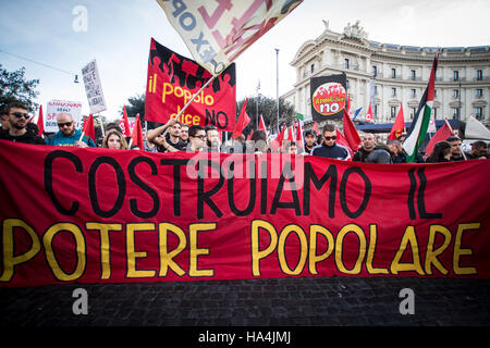 Rome 27 November 2016,Thousands of people take to the streets to say 'NO' at the upocoming constitutional referendum and to protest against Prime Minister Matteo Renzi's government politics in Rome, Italy .Italians will be called on Dec 4 to vote , in a referendum proposed by Premier Matteo Renzi's government ,over a reform that i approved will change the countr's Constitution adoped in 1947.  the picutred a give event of the no referendum on costitutional committees Stock Photo