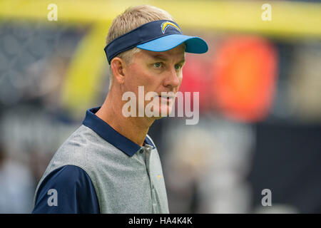 Houston, Texas, USA. 27th Nov, 2016. San Diego Chargers head coach Mike McCoy watches warmups prior to an NFL game between the Houston Texans and the San Diego Chargers at NRG Stadium in Houston, TX on November 27th, 2016. The Chargers won the game 21-13. Credit:  Trask Smith/ZUMA Wire/Alamy Live News Stock Photo
