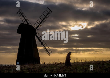 Rottingdean, East Sussex, UK. 27th Nov, 2016. Sunset over the English Channel at the Rottingdean Windmill in East Sussex. Credit:  Andrew Hasson/Alamy Live News Stock Photo