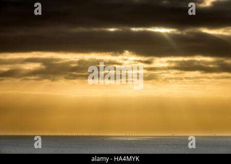 Rottingdean, East Sussex, UK. 27th Nov, 2016. Sunset over a new wind farm in the English Channel seen from Rottingdean in East Sussex. Credit:  Andrew Hasson/Alamy Live News Stock Photo