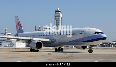 Osaka, Japan. 18th Nov, 2016. An Airbus A350 of China Airlines at the airport in Osaka, Japan, 18 November 2016. The German Federal President is on a five day visit in Japan. Photo: Wolfgang Kumm/dpa/Alamy Live News Stock Photo