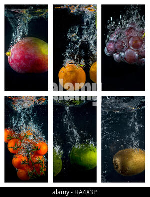 Fruits and vegetables falling into the water with splashes and bubbles Stock Photo