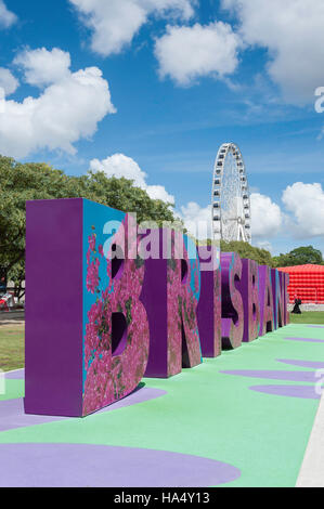 Brisbane G20 sign with Wheel of Brisbane behind, South Bank Parklands, South Bank, Brisbane, Queensland, Australia Stock Photo