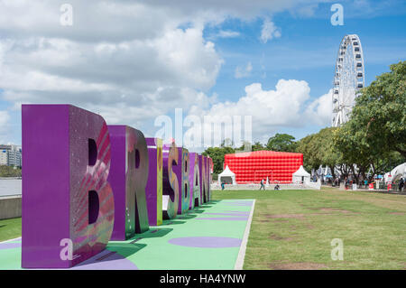 Brisbane G20 sign with Wheel of Brisbane behind, South Bank Parklands, South Bank, Brisbane, Queensland, Australia Stock Photo