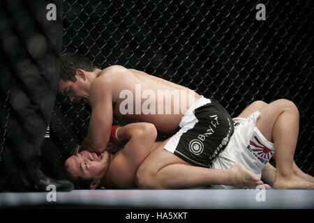Lyoto Machida, top, fights Kazuhiro Nakamura  at UFC 76 during a mixed martial arts match at the Honda Center in Anaheim, CA on Saturday Sept. 22, 2007. Photo credit: Francis Specker Stock Photo
