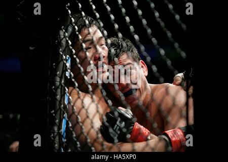 Kazuhiro Nakamura, left, fights Lyoto Machida at UFC 76 during a mixed martial arts match at the Honda Center in Anaheim, CA on Saturday Sept. 22, 2007. Photo credit: Francis Specker Stock Photo
