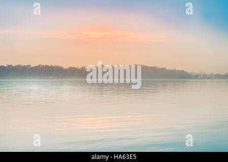 Sunrise on the quiet lake and reeds Stock Photo