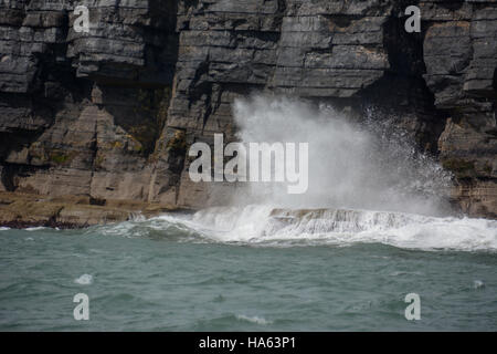 Waves crashing against cliffs on north side of Valentia Island, County ...