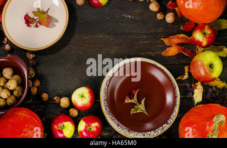 Autumn table setting with pumpkins and apples. Top view Stock Photo