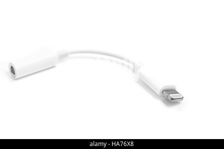 Lightning to jack 3.5mm headphone adapter isolated on white background. Digital accessory concept, designed for Apple Stock Photo