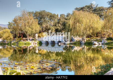 Los Angeles, CA, USA – November 25, 2016: Long cement bridge in the Chinese garden at the Huntington Botanical Gardens in Los An Stock Photo
