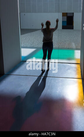 Silhouette of a teenager at the Centre Pompidou musuem in Malaga, Andalusia, Spain. Stock Photo