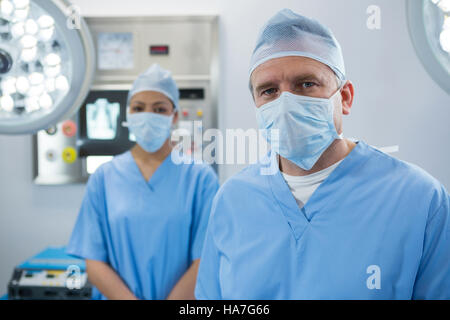 Portrait of surgeons wearing surgical mask Stock Photo