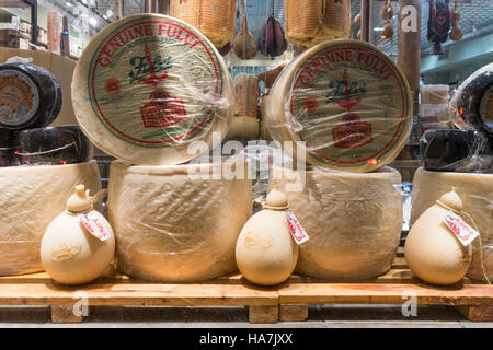 Pecorino Romano cheese wheels in the window of Di Palo's Fine Foods in Little Italy in New York City Stock Photo