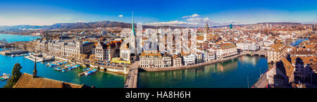 View of historic Zurich city center with famous Grossmunster Church, Limmat river and Zurich lake. Zuerich is the largest city in Switzerland. Stock Photo