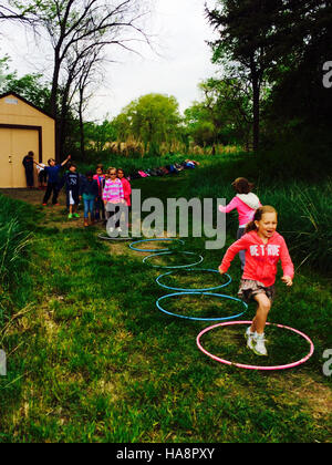 Two Ponds National Wildlife Refuge offers educational programs for children, fostering an appreciation for nature and science. Through hands-on activities, children learn about local ecosystems, wildlife conservation, and the importance of environmental stewardship in national parks. Stock Photo