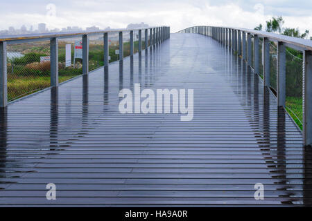 TEL-AVIV - JANUARY 25, 2016: A foot bridge, part of the beach promenade, north of the port compound, in Tel-Aviv, Israel Stock Photo