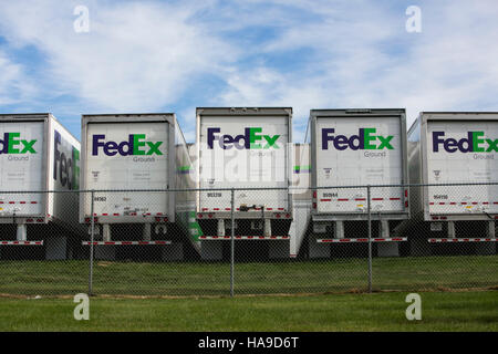 FedEx Ground logos on truck trailers lined up at a facility in Dayton, New Jersey on November 6, 2016. Stock Photo