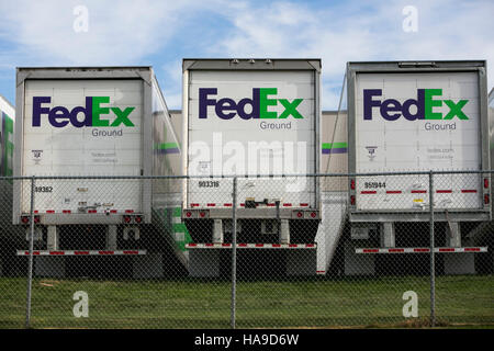 FedEx Ground logos on truck trailers lined up at a facility in Dayton, New Jersey on November 6, 2016. Stock Photo