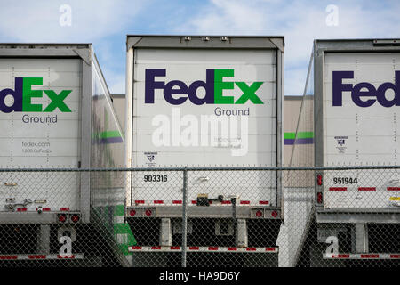 FedEx Ground logos on truck trailers lined up at a facility in Dayton, New Jersey on November 6, 2016. Stock Photo