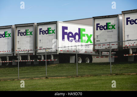 FedEx Ground logos on truck trailers lined up at a facility in Dayton, New Jersey on November 6, 2016. Stock Photo