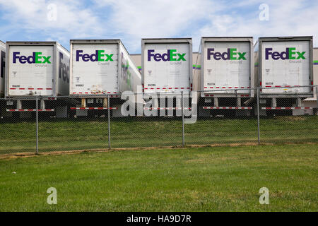 FedEx Ground logos on truck trailers lined up at a facility in Dayton, New Jersey on November 6, 2016. Stock Photo