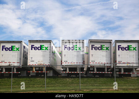 FedEx Ground logos on truck trailers lined up at a facility in Dayton, New Jersey on November 6, 2016. Stock Photo