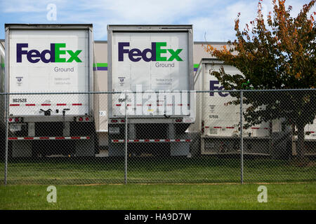 FedEx Ground logos on truck trailers lined up at a facility in Dayton, New Jersey on November 6, 2016. Stock Photo