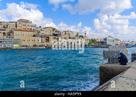 TEL-AVIV, ISRAEL - MAY 27, 2016: View of the Jaffa port and of the old city of Jaffa, with locals and visitors, now part of Tel-Aviv Yafo, Israel Stock Photo