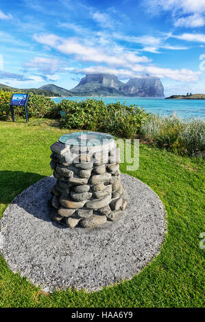 Sundial overlooking The Lagoon, with Mt Gower and Mt Lidgbird in the distance, Lord Howe Island, Australia Stock Photo