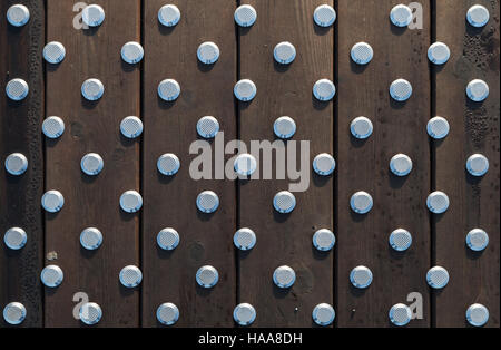 Outdoor wooden flooring with steel anti-slip elements, flat background photo texture, top view Stock Photo