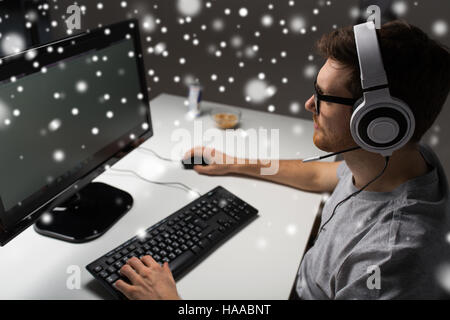 close up of man playing computer video game Stock Photo