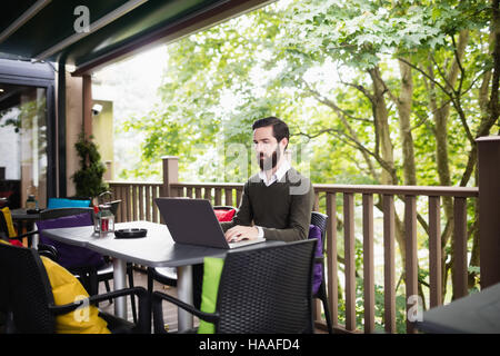 Man using laptop Stock Photo