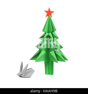 Green origami christmas tree and rabbit isolated on white background Stock Photo