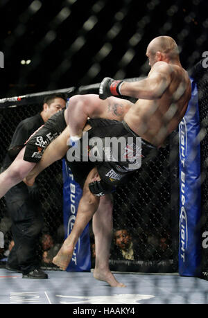 Brock Lesnar, left, fights Randy Couture at UFC 91at the MGM Grand Garden Arena on November 15, 2008 in Las Vegas, NV. Francis Specker Stock Photo