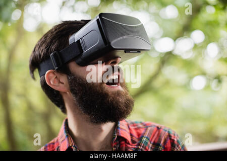 Man using virtual reality headset Stock Photo