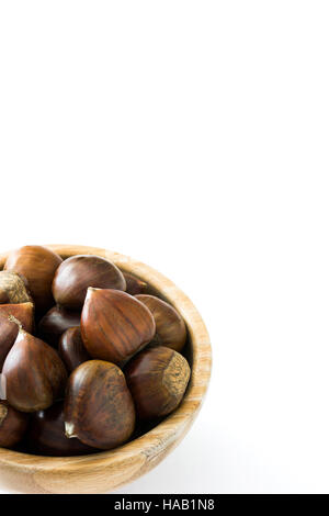 Chestnuts in a bowl isolated on white background Stock Photo
