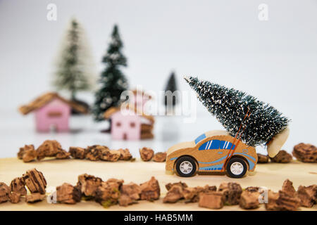 Car carrying a Christmas tree Stock Photo