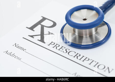 Medical prescription form with stethoscope over it Stock Photo