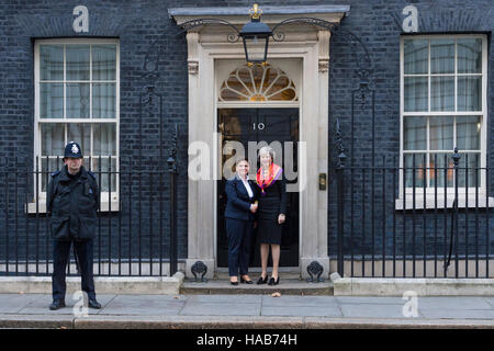 London, Britain. 28th November, 2016. Theresa May, the British Prime Minister, greeting Beata Szydło Prime Minister of Poland, as he arrives at 10 Downing Street, London.  The Prime Minsters are are holding historic bilateral summit designed to strengthen the relationship between the UK and Poland as Britain prepares to leave the EU. The summit will bring together both Prime Ministers along with a number of their senior Cabinet ministers, including the Chancellor and the Foreign and Defence Secretaries, for the first meeting of it’s kind. Credit:  Alex MacNaughton/Alamy Live News Stock Photo
