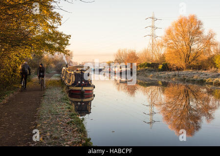 Tottenham Marshes, London, UK 29th November 2016. Cyclists experience a frosty commute along the river Lee navigation towpath in Tottenham on a clear November morning. Credit:  Patricia Phillips/ Alamy Live news Stock Photo