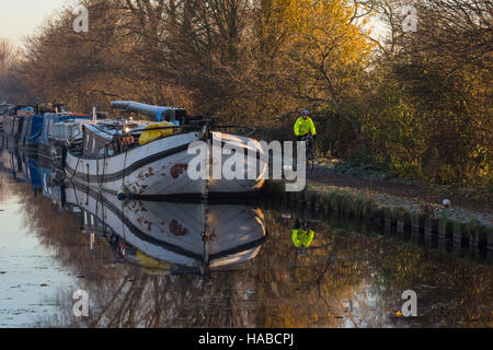 Tottenham Marshes, London, UK 29th November 2016. Cyclists experience a frosty commute along the river Lee navigation towpath in Tottenham on a clear November morning. Credit:  Patricia Phillips/ Alamy Live news Stock Photo