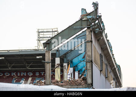 London, UK. 29th Nov, 2016. Heavy machinery is used to demolish the East Stand at West Ham United's former Boleyn Ground stadium in Upton Park. The East Stand was once home to West Ham's notorious 'Chicken Run'. Credit:  Mark Kerrison/Alamy Live News Stock Photo